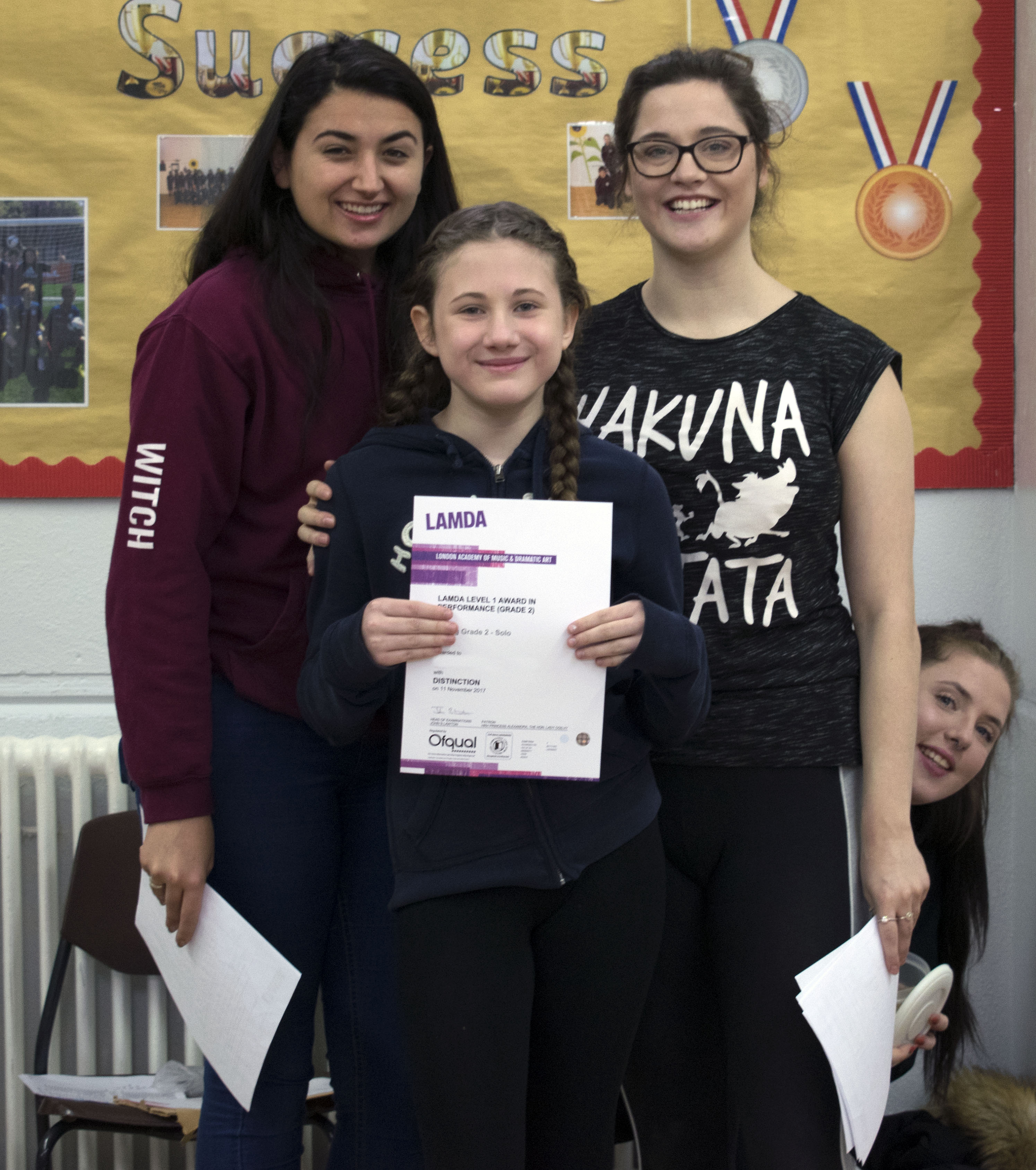 Picture of a girl with her LAMDA certificate
