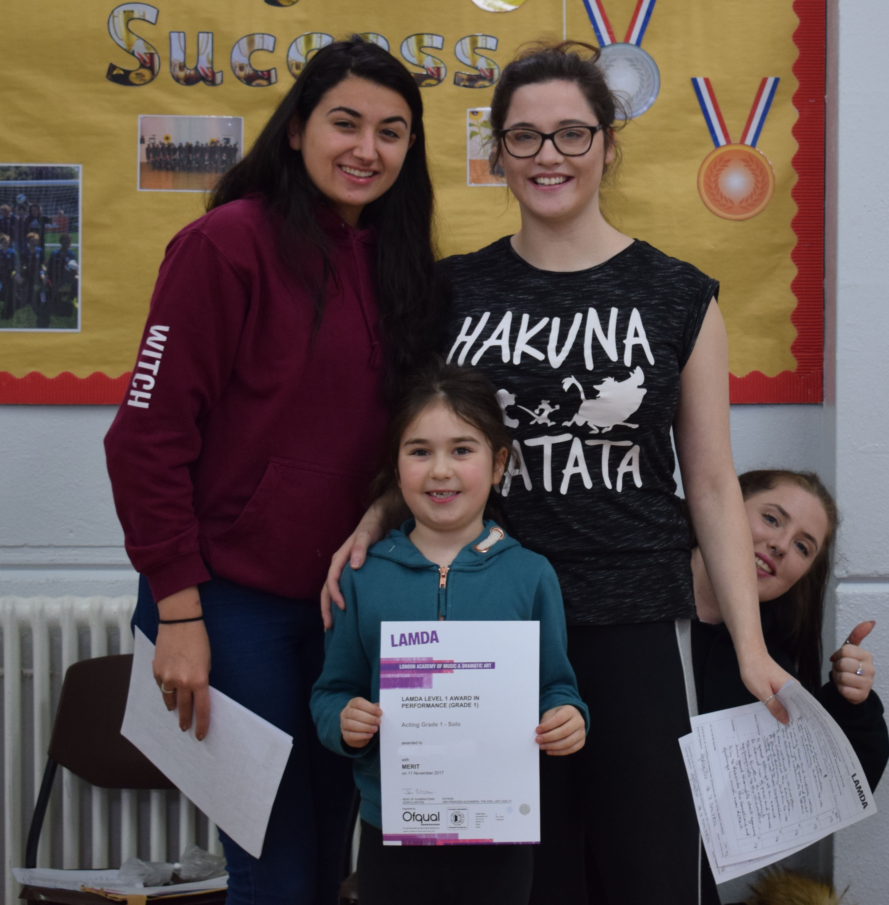 Photo of young girl with LAMDA certificate